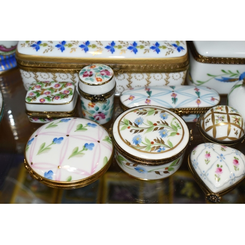 409 - A GROUP OF LIMOGES PORCELAIN, to include a near pair of ewers, height 21cm, a tray painted with flow... 