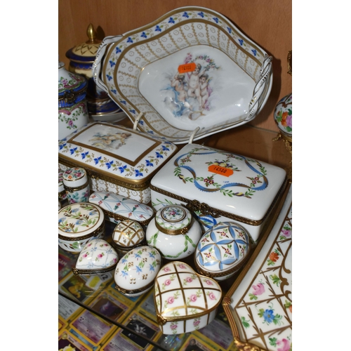 409 - A GROUP OF LIMOGES PORCELAIN, to include a near pair of ewers, height 21cm, a tray painted with flow... 