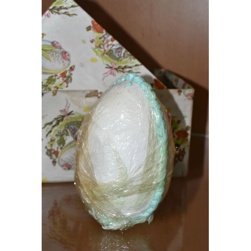 434 - A BOXED AND WRAPPED 1940S 'PANORAMA' EASTER EGG, with a newspaper cutting, a Czechoslovakian made de... 