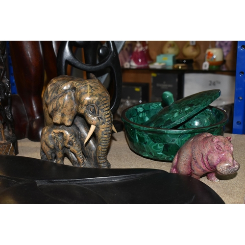 445 - AN ASSORTMENT OF TRIBAL ART SCULPTURES to include a green malachite egg 10cm height, a green malachi... 