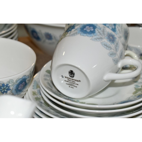 459 - A WEDGWOOD 'CLEMENTINE' DINNER SET consisting six dinner plates, coffee pot, tea pot, covered tureen... 