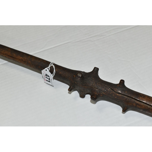 471 - AN 18TH CENTURY GNARLED WOOD, INLAID PIN WORK AND PAINTED WALKING CANE, the smoothed top bearing inl... 