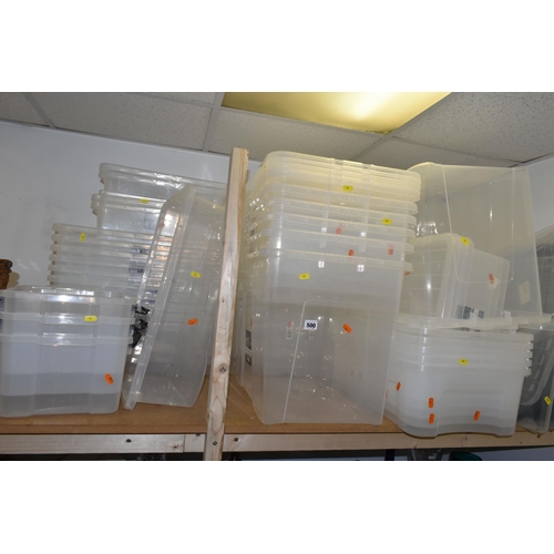 500 - A LARGE QUANTITY OF CLEAR PLASTIC STORAGE BOXES to include approximately 25 boxes of various capacit... 