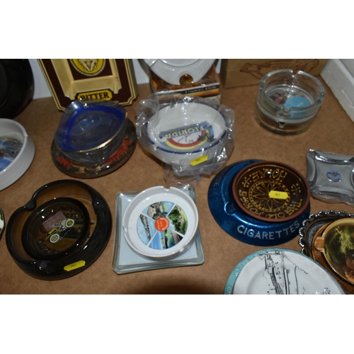 503 - A LARGE QUANTITY OF VARIOUS ASHTRAYS AND PIN DISHES, to include an assortment of branded and souveni... 