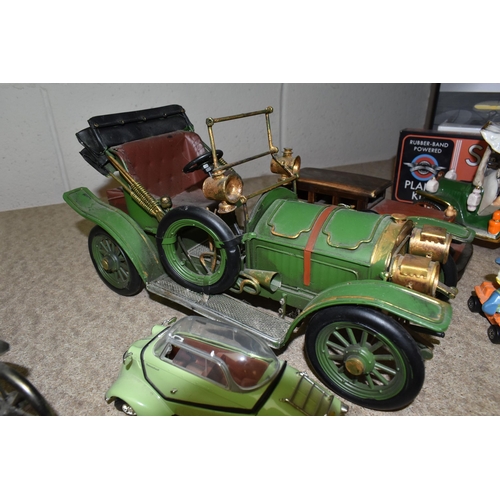 530 - AN ASSORTMENT OF ORNAMENTAL CARS, A MOTION CONTROL DRONE AND TWO RUBBER POWERED PLANES to include a ... 