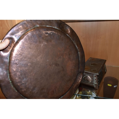 346 - A GROUP OF ARTS & CRAFTS COPPER, comprising a hand hammered copper charger, diameter 37cm, together ... 