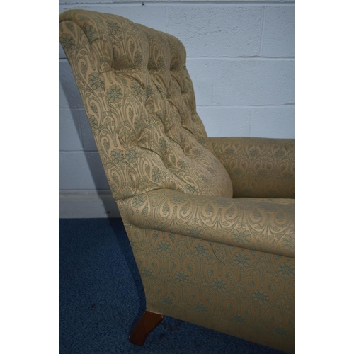 1351 - A LATE VICTORIAN ARMCHAIR, with deep armrests, on carved front legs, and ceramic casters, width 75cm... 