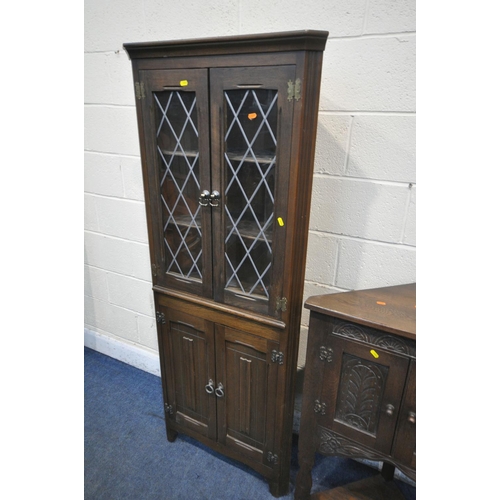 1199 - AN OAK LINENFOLD DRESSER, with two drawers, width 100cm x depth 47cm x height 187cm, an oak two door... 