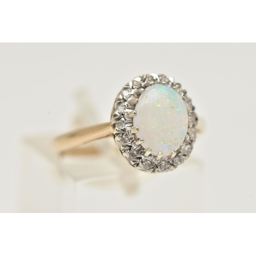 12 - A 9CT GOLD OPAL AND DIAMOND CLUSTER RING, of an oval form, set with an oval cut white opal cabochon,... 