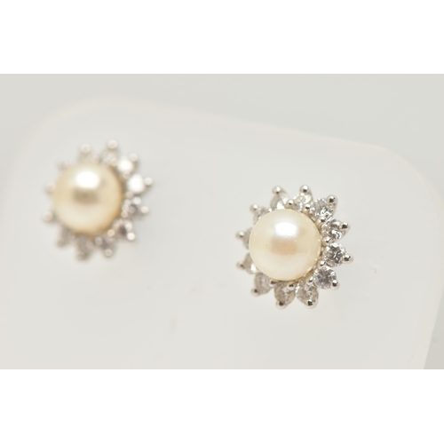 18 - A PAIR OF 18CT WHITE GOLD CUTLURED PEARL AND DIAMOND CLUSTER EARRINGS, each earring of a circular fo... 