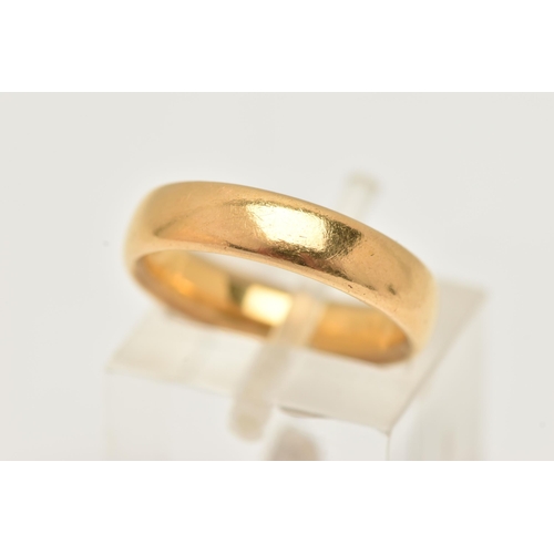24 - A 1920s 22CT YELLOW GOLD WEDDING BAND, designed as a plain polished band, approximate width of band ... 