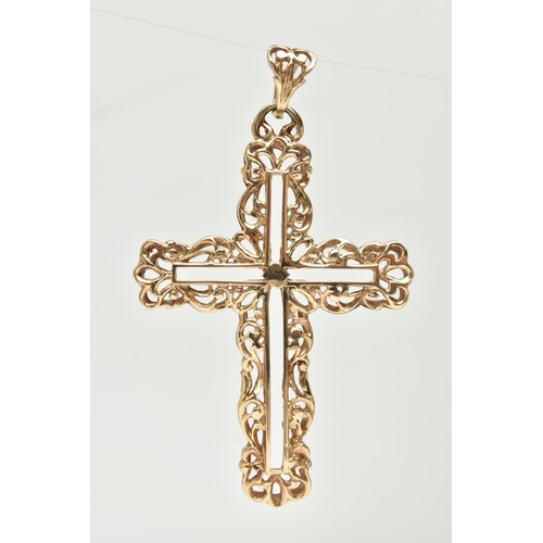 6 - A LARGE 9CT GOLD CROSS PENDANT, a yellow gold open work cross with acanthus style detail, fitted wit... 