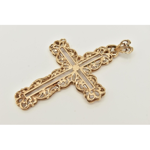 6 - A LARGE 9CT GOLD CROSS PENDANT, a yellow gold open work cross with acanthus style detail, fitted wit... 