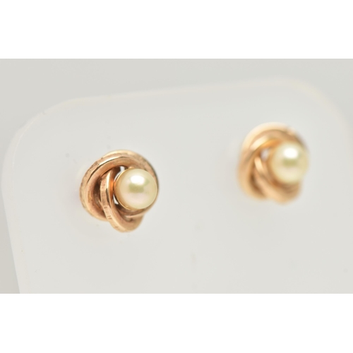 36 - A PAIR OF 9CT GOLD AND CULTURED PEARL EARRINGS, a yellow gold knot design earring with a principally... 