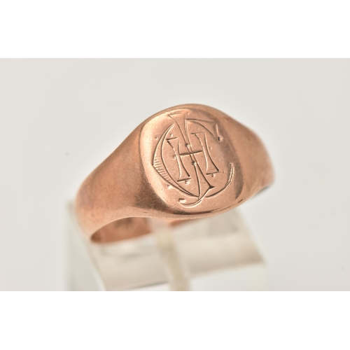 50 - A GENTS EARLY 20TH CENTURY, 9CT ROSE GOLD SIGNET RING, engraved oval signet, polished tapering band,... 