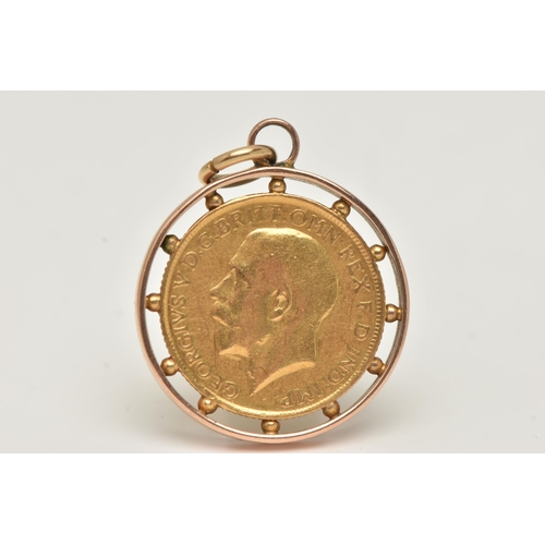 68 - A MOUNTED FULL GOLD SOVEREIGN COIN, a George V full sovereign dated 1913, rose metal applied bead wo... 
