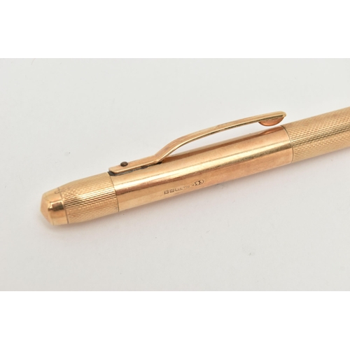 70 - A 9CT GOLD PROPELLING PENCIL, engine turned and polished pattern, hallmarked 9ct Birmingham 1987, ma... 