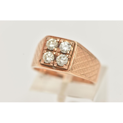 75 - A DIAMOND SIGNET RING, designed as four brilliant cut diamonds in claw settings, to the engraved dia... 