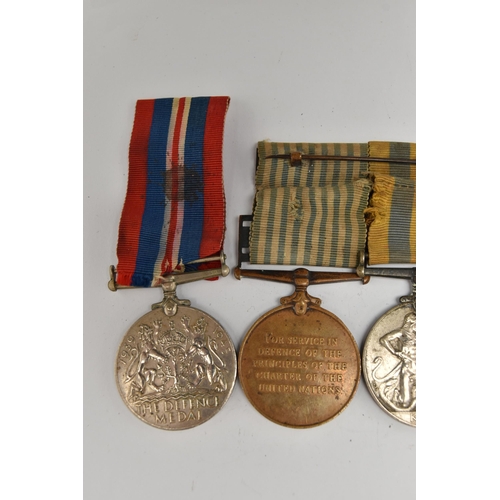 102 - A SELECTION OF MEDALS, to include a George VI, Palestine general service medal, awarded to 'CAPT. H.... 