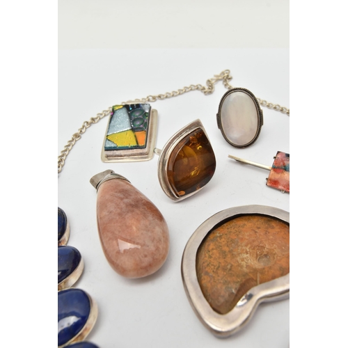 95 - AN ASSORTMENT OF SILVER AND WHITE METAL  JEWELLERY, to include a silver and copal amber ring, hallma... 