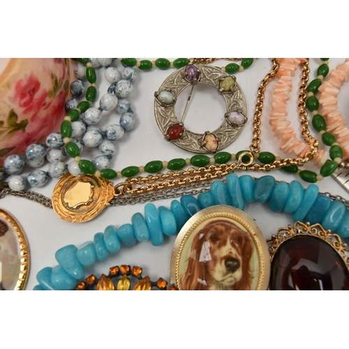 118 - A BAG OF ASSORTED COSTUME JEWELLERY, to include various beaded necklaces, bangles, brooches, pendant... 