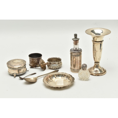 136 - AN ASSORTMENT OF SILVERWARE, to include a weighted base posy vase, a circular form trinket box on th... 