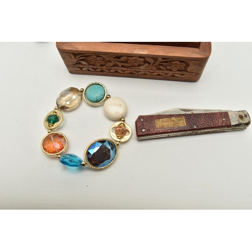 142 - A BOX OF ASSORTED ITEMS, to include a silver belt buckle ring, hallmarked Birmingham, an Egyptian si... 