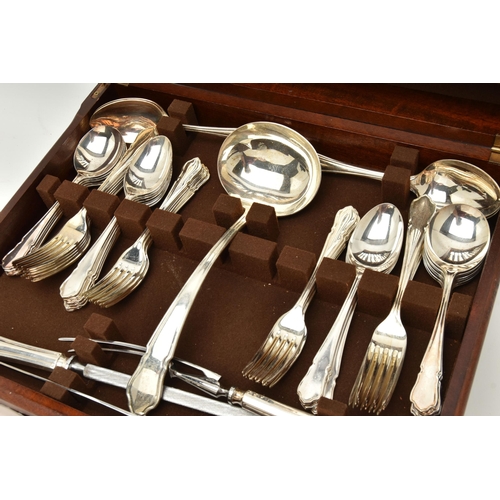 162 - A LARGE WOODEN CANTEEN, complete with a twelve person table setting of stainless steel cutlery, cant... 