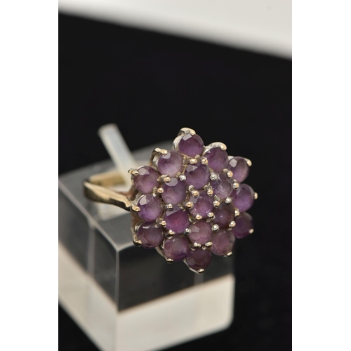 175 - A 9CT YELLOW GOLD AMETHYST RING AND A BACK AND FRONT LOCKET, the ring designed as a hexagonal shape ... 