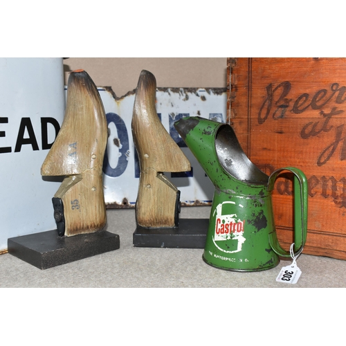 303 - SIX ADVERTISING ITEMS AND SIMILAR, to include a pair of reproduction shoe last bookends, a green Cas... 