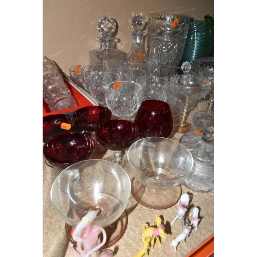 306 - A LARGE GROUP OF ASSORTED CLEAR AND COLOURED GLASSWARE to include a quantity of Royal Doulton whisky... 