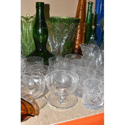 306 - A LARGE GROUP OF ASSORTED CLEAR AND COLOURED GLASSWARE to include a quantity of Royal Doulton whisky... 