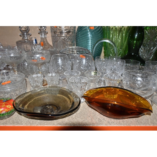 306 - A LARGE GROUP OF ASSORTED CLEAR AND COLOURED GLASSWARE to include a quantity of Royal Doulton whisky... 