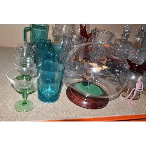 306 - A LARGE GROUP OF ASSORTED CLEAR AND COLOURED GLASSWARE to include a quantity of Royal Doulton whisky... 