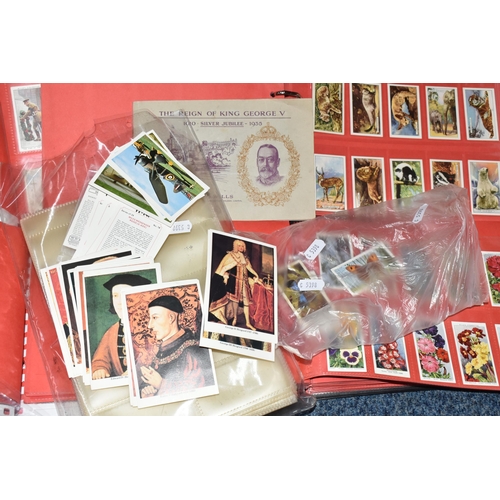 309 - ONE BOX OF CIGARETTE CARDS IN FOUR ALBUMS & LOOSE comprising full and part sets of popular cards, mo... 