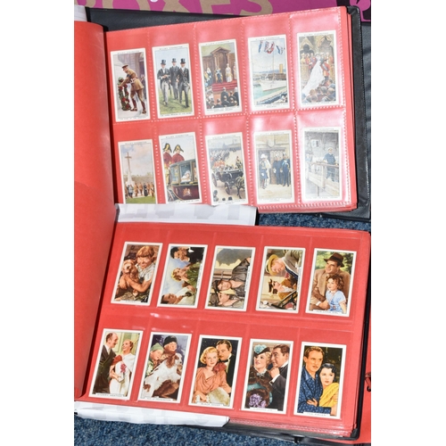 309 - ONE BOX OF CIGARETTE CARDS IN FOUR ALBUMS & LOOSE comprising full and part sets of popular cards, mo... 