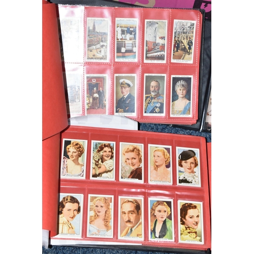 309 - ONE BOX OF CIGARETTE CARDS IN FOUR ALBUMS & LOOSE comprising full and part sets of popular cards, mo... 