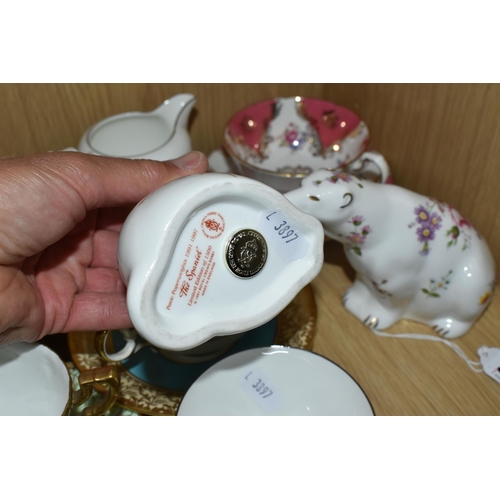 321 - A GROUP OF NAMED TEAWARE AND TWO ROYAL CROWN DERBY PAPERWEIGHTS, comprising two Royal Crown Derby pa... 