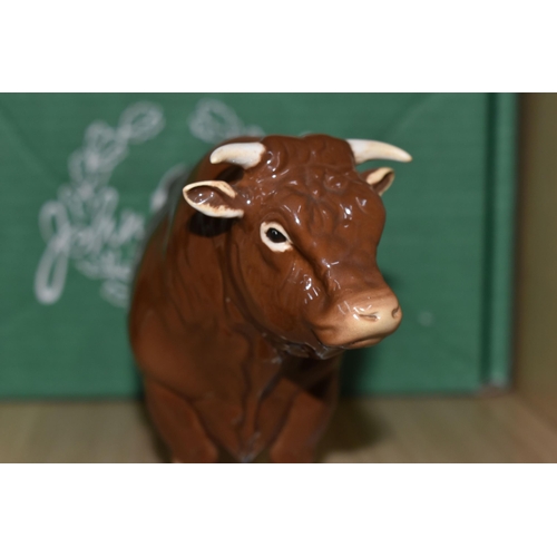 325 - A BOXED BESWICK 'LIMOUSIN BULL' FIGURINE, model number 2463B, issued in 1998 in a limited edition of... 