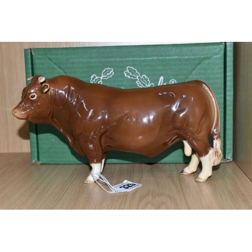 325 - A BOXED BESWICK 'LIMOUSIN BULL' FIGURINE, model number 2463B, issued in 1998 in a limited edition of... 