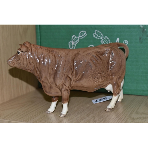 327 - A BOXED BESWICK 'LIMOUSIN COW', comprising model number 3075B, brown and white gloss, issued 1998 in... 