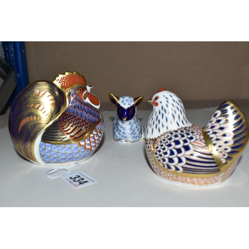 334 - THREE ROYAL CROWN DERBY PAPERWEIGHTS, comprising 'Cockerel' and 'Lamb', both have gold stoppers and ... 