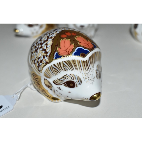 344 - FOUR ROYAL CROWN DERBY PAPERWEIGHTS, comprising Hawthorn and Bramble hedgehogs, signature editions o... 