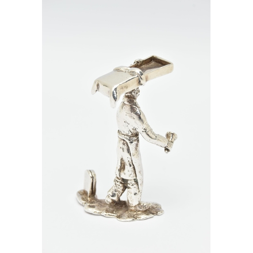 145A - AN ELIZABETH II SILVER MENU HOLDER IN THE FORM OF THE MUFFIN MAN, maker Thomas Charles Jarvis, Londo... 