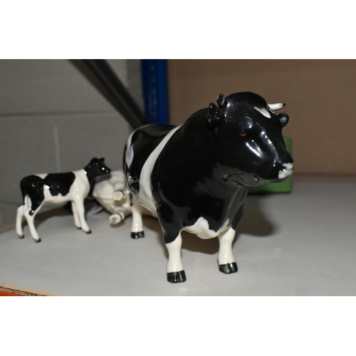 352 - THREE BESWICK FRIESIAN CATTLE FIGURES, comprising boxed Friesian Cow Ch. 'Claybury Leegwater' model ... 