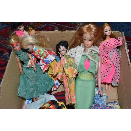 354 - A QUANTITY OF EARLY 1970S DOLLS AND CLOTHING, to include Mattel Heather from Rock Flowers, Topper Da... 