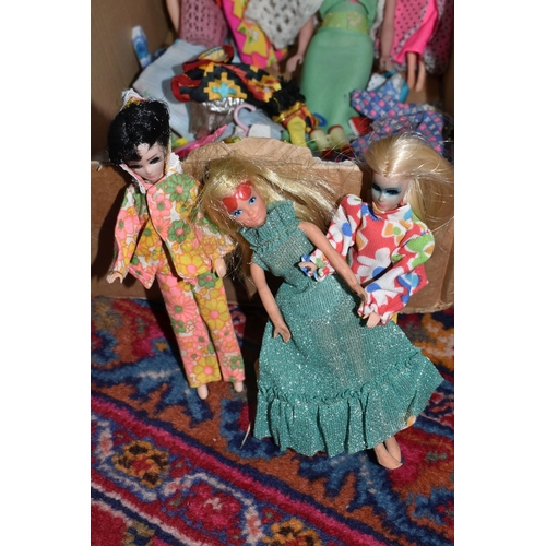 354 - A QUANTITY OF EARLY 1970S DOLLS AND CLOTHING, to include Mattel Heather from Rock Flowers, Topper Da... 