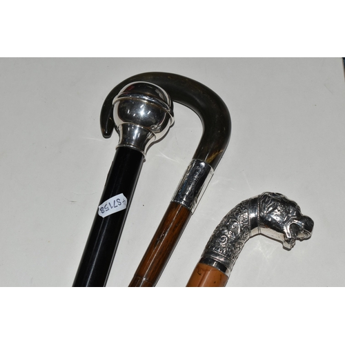 358 - A GROUP OF FOUR WALKING STICKS AND A HUNT MASTER'S RIDING CROP, comprising a Moss Bros. plaited leat... 