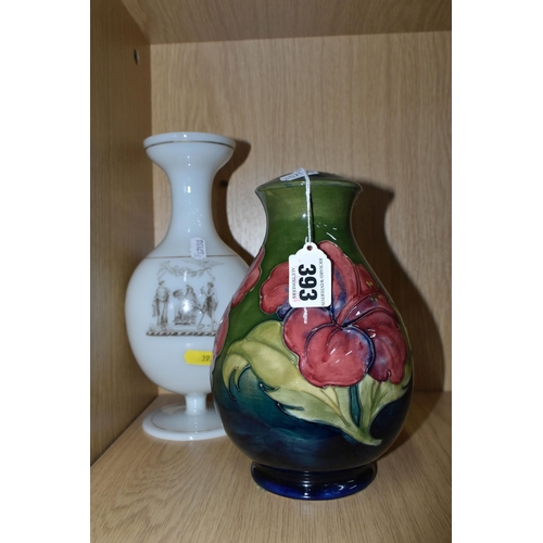 393 - A MOORCROFT POTTERY 'HIBISCUS' PATTERN LAMP BASE, together with a transfer printed milk glass vase, ... 