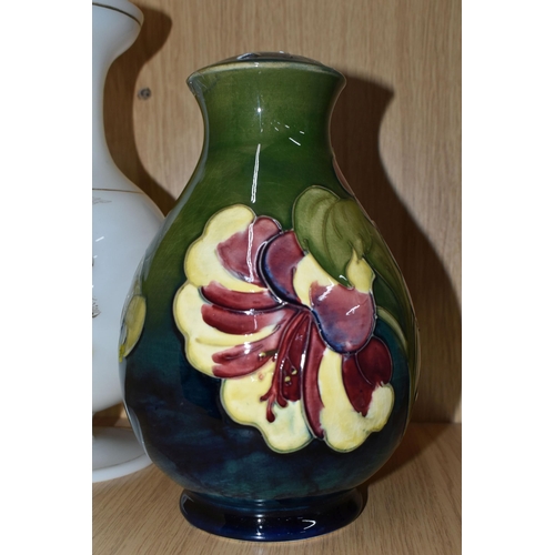 393 - A MOORCROFT POTTERY 'HIBISCUS' PATTERN LAMP BASE, together with a transfer printed milk glass vase, ... 